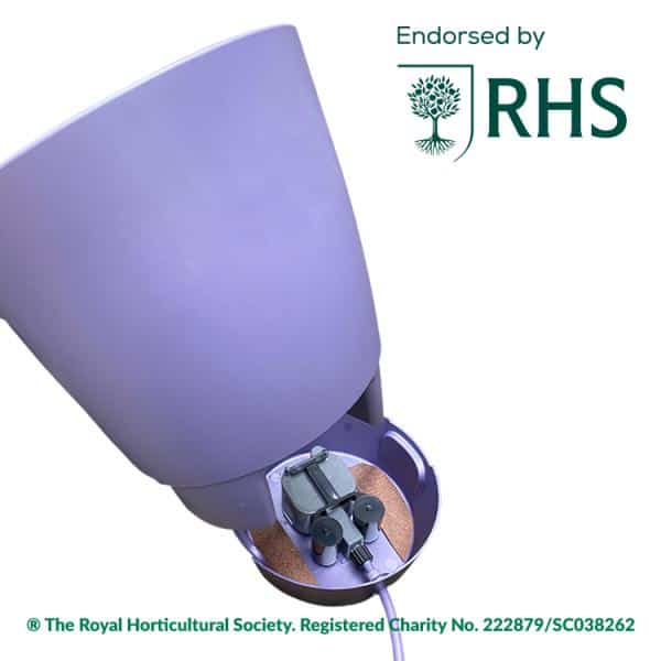 Purple planter with an exposed built-in irrigation mechanism at the base, a cord attached, and an RHS 'Endorsed by' logo in the top-right corner.