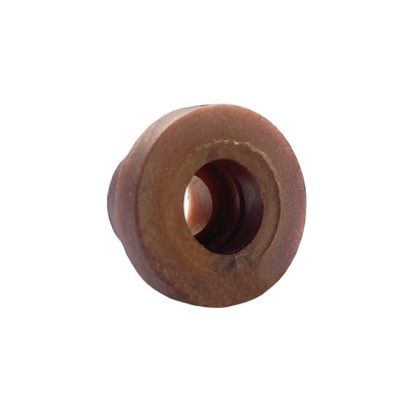 Brown donut-shaped rubber bushing with a hollow center viewed from the side