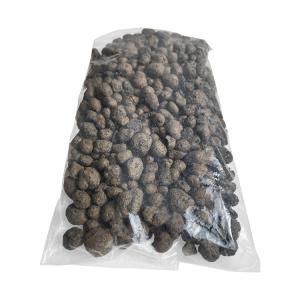 Clear plastic bag filled with many small dark brown pellets.